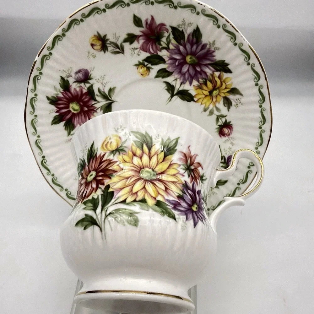 Vintage Queen's Rosina Wild Flowers fine bone china Tea cup with matching saucer